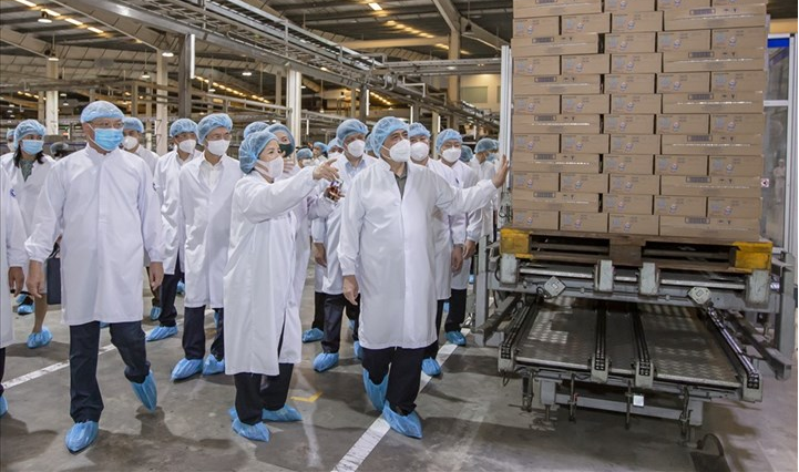 Vinamilk - Nhìn lại một năm 'vượt sóng COVID' để ghi dấu ấn Việt Nam trên bản đồ ngành sữa thế giới ảnh 1