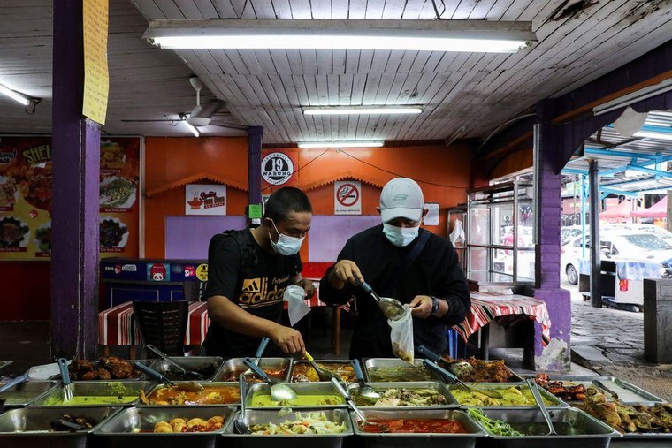 Malaysia và Philippines nới lỏng quy định phòng dịch ảnh 1