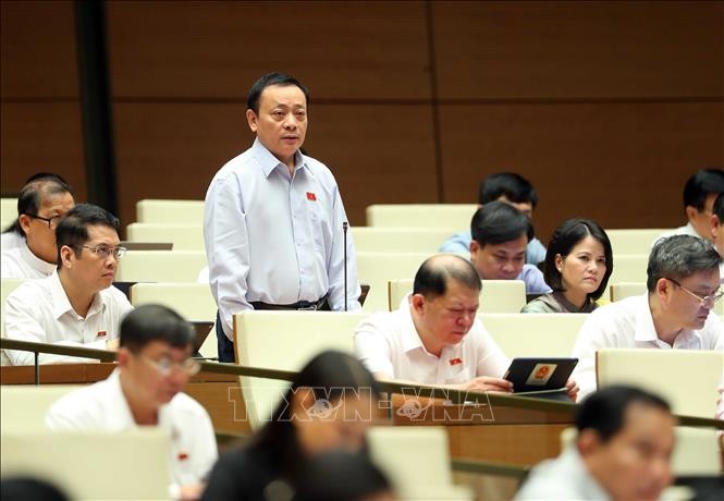 Quốc hội tiếp tục chất vấn nhóm lĩnh vực văn hoá - xã hội ảnh 13