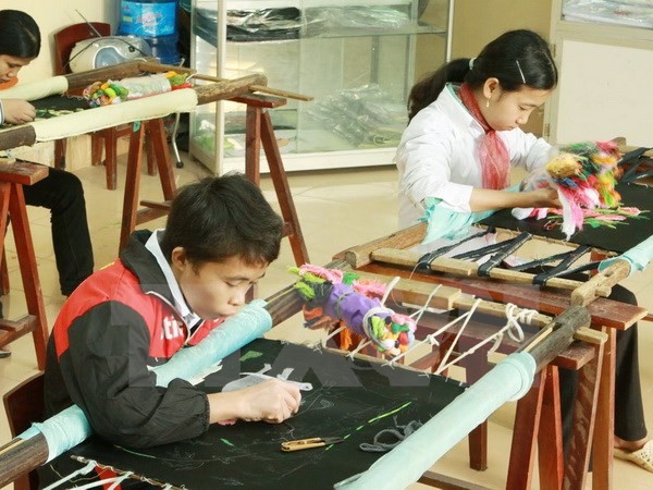 Đại tướng Ngô Xuân Lịch thăm, chúc Tết ở Làng hữu nghị Việt Nam ảnh 1