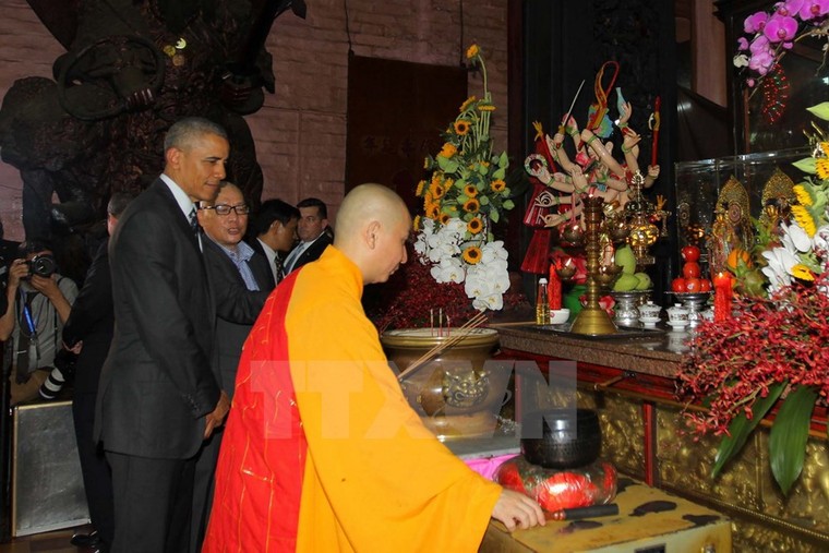 Những hình ảnh đầu tiên của ông Obama ở TP Hồ Chí Minh ảnh 3