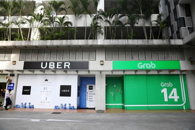 Uber nói sẽ ngừng những thương vụ bán mình như với Grab ảnh 2