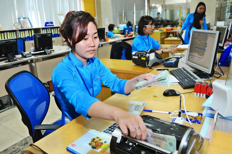 Khơi thông nguồn vốn tín dụng hỗ trợ doanh nghiệp ảnh 1