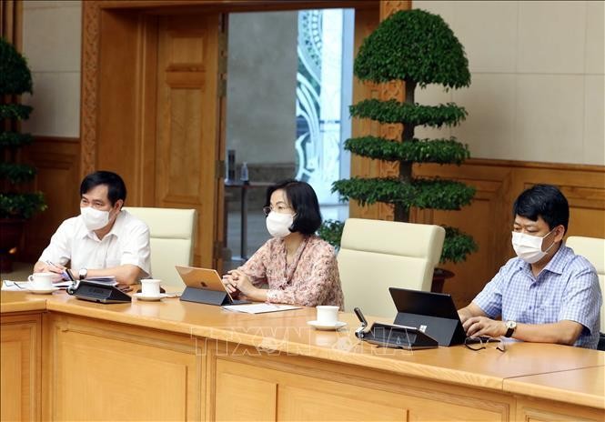 Phó Thủ tướng Vũ Đức Đam chủ trì cuộc họp BCĐ Quốc gia phòng, chống dịch bệnh COVID-19 ảnh 4
