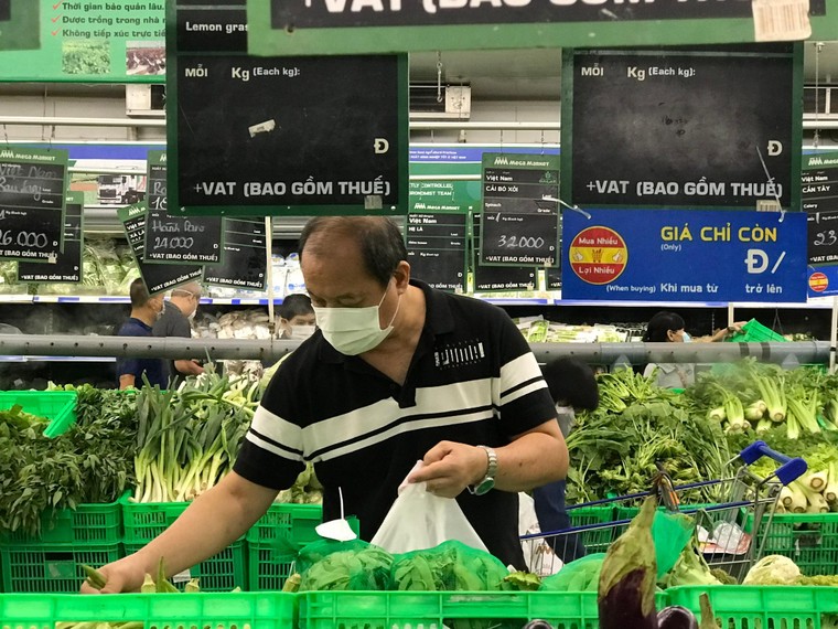 Từ tuần sau, quận 7 và huyện Củ Chi cho phép người dân đi chợ một tuần/lần ảnh 1