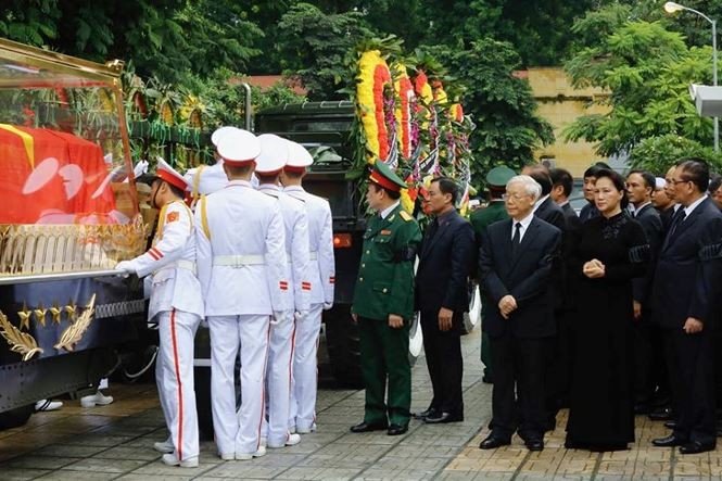 Cỗ linh xa đưa Chủ tịch nước Trần Đại Quang rời nhà tang lễ ảnh 3