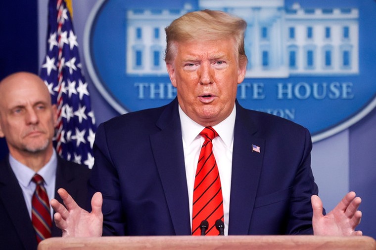 Mỹ tiếp tục vật lộn trong cuộc chiến không cân sức với COVID-19 ảnh 1