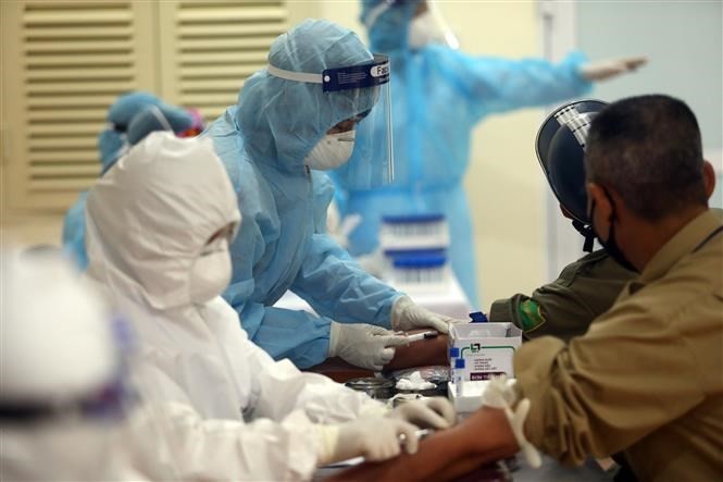 Điều gì sẽ xảy ra nếu không có vắc-xin phòng COVID-19? ảnh 2