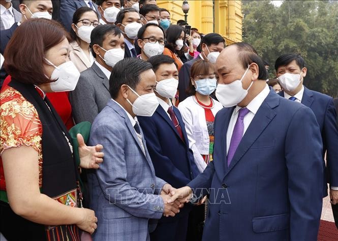 Chủ tịch nước Nguyễn Xuân Phúc gặp mặt cán bộ y tế tiêu biểu toàn quốc ảnh 6