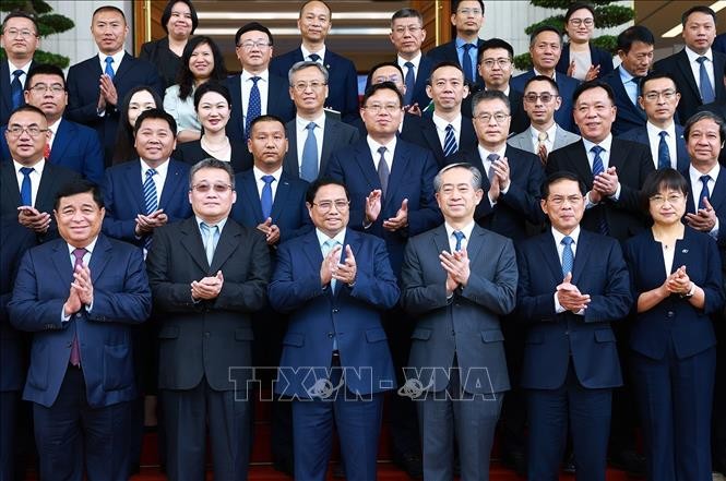 Thủ tướng tọa đàm với doanh nghiệp Trung Quốc về kinh tế xanh, kinh tế số ảnh 1