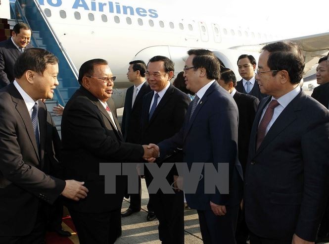 Tổng Bí thư, Chủ tịch nước Lào thăm chính thức Việt Nam ảnh 1