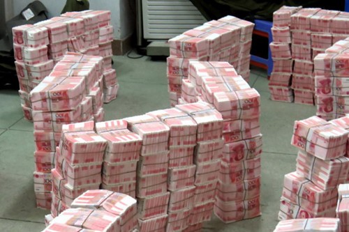 Trung Quốc phá vụ tiền giả lớn nhất từ trước đến nay ảnh 1