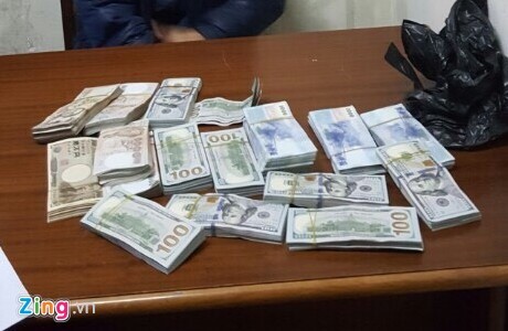 Dàn kịch để cuỗm bọc tiền ngoại tệ trị giá hơn 6 tỷ đồng ảnh 1