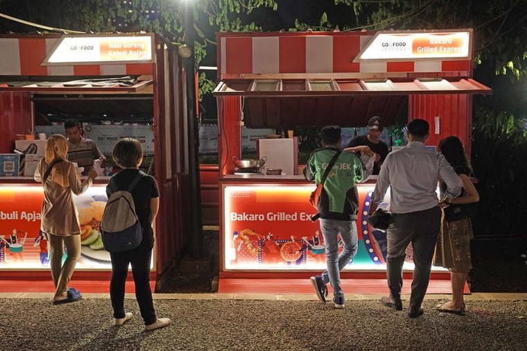 Ngành giao đồ ăn trực tuyến tại ĐNA: Cuộc chơi riêng của Grab và Gojek ảnh 2