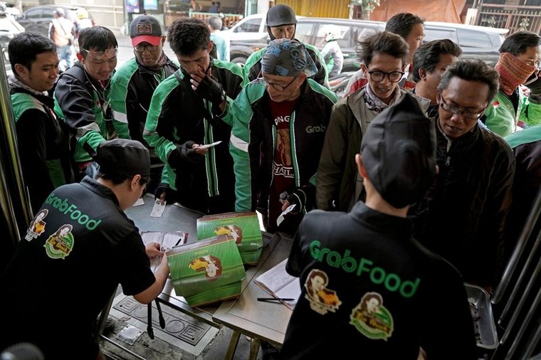 Ngành giao đồ ăn trực tuyến tại ĐNA: Cuộc chơi riêng của Grab và Gojek ảnh 3