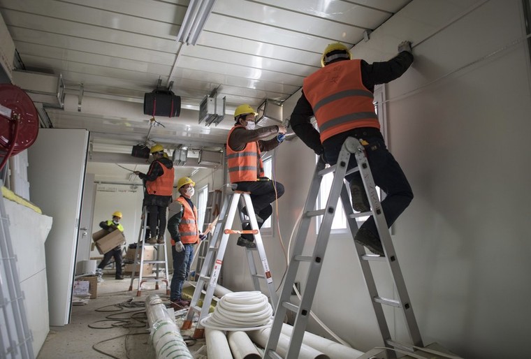 Bệnh viện Hỏa Thần Sơn mở cửa đón những bệnh nhân Vũ Hán đầu tiên ảnh 6