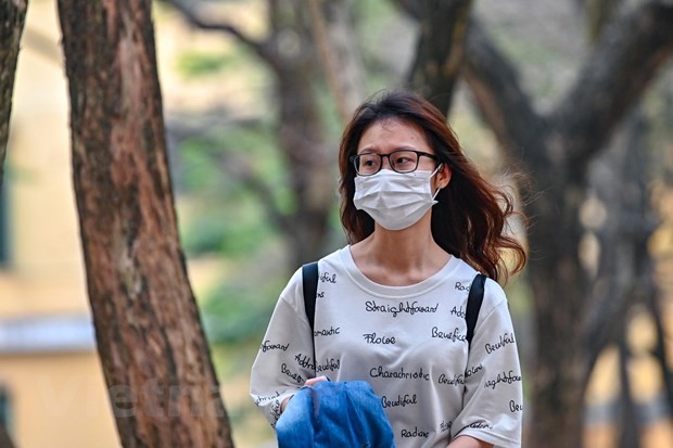 Sinh viên Hà Nội được kiểm tra thân nhiệt trước khi vào học ảnh 6