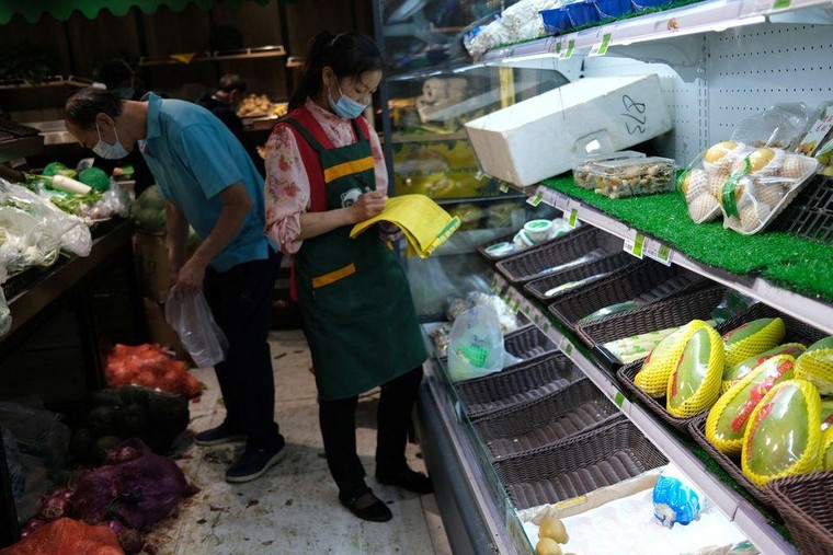 Người Bắc Kinh đổ xô tích trữ thực phẩm ảnh 1