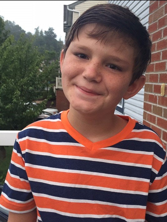 Cậu bé bị cắt 1/6 não bộ vẫn sống bình thường ảnh 1