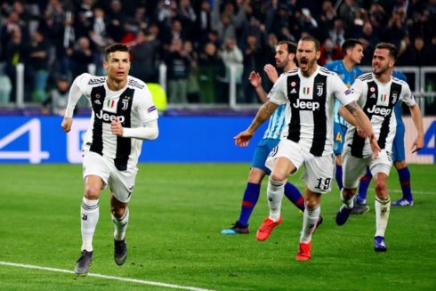 Ronaldo lập hat-trick giúp Juventus đi tiếp vào tứ kết Champions League ảnh 1
