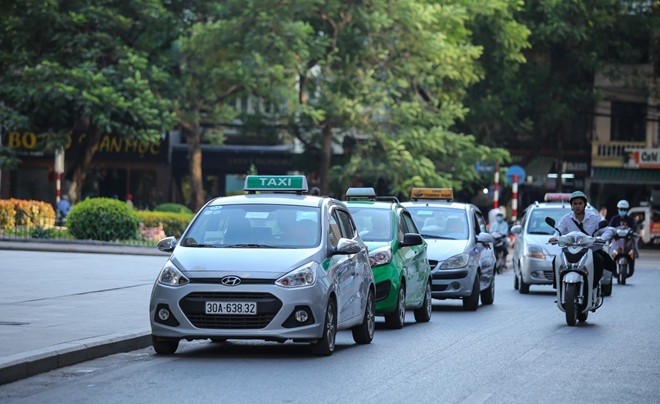 Bộ GTVT nói gì về quy định ‘mặc đồng phục’ cho taxi ảnh 1