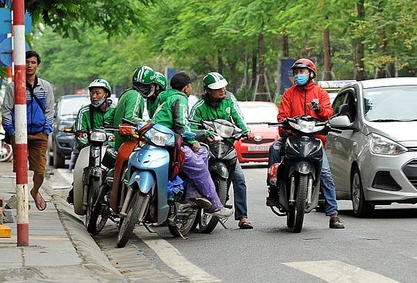 Hàng trăm nghìn xe ôm Grab, GoViet... gặp vướng mắc vì thuế thu nhập cá nhân ảnh 1