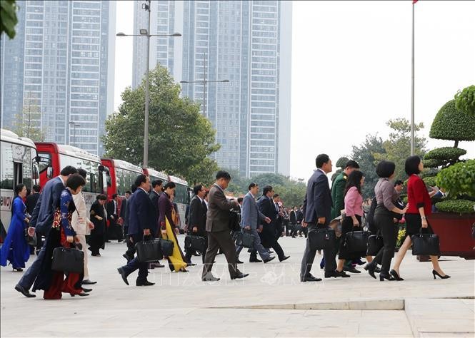 Chiều 27/1, đại biểu tiếp tục thảo luận về văn kiện đại hội tại hội trường ảnh 7