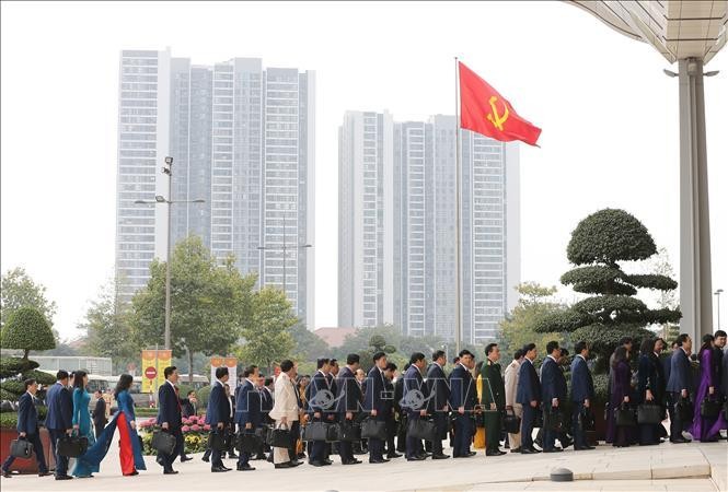 Chiều 27/1, đại biểu tiếp tục thảo luận về văn kiện đại hội tại hội trường ảnh 8