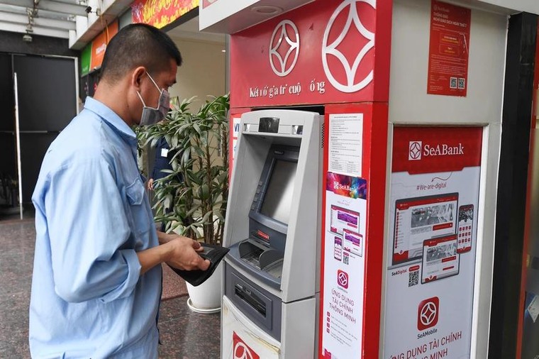Thẻ ATM cũ giao dịch thế nào sau ngày 31/12 ảnh 1