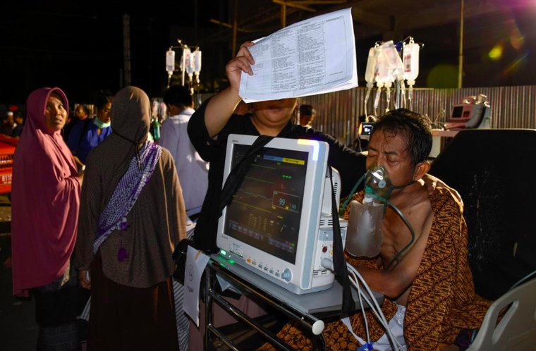 Hình ảnh trận động đất kinh hoàng tại Indonesia khiến 82 người thiệt mạng ảnh 6