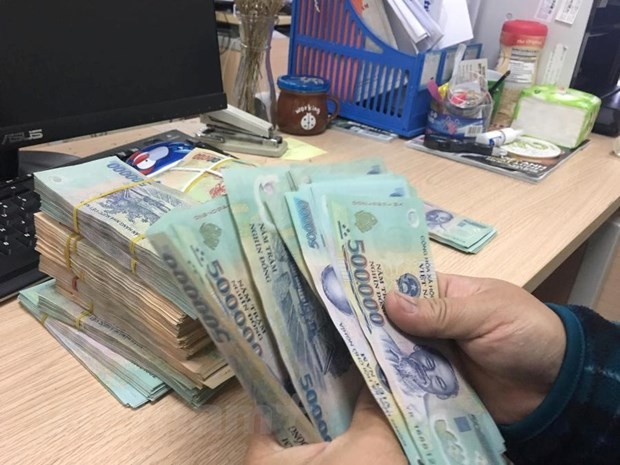 Ngan hang va to chuc chinh tri-xa hoi hop luc day lui tin dung den hinh anh 1