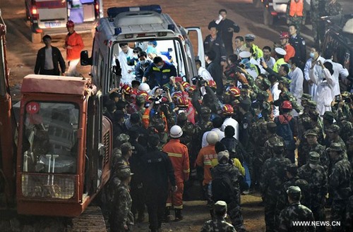 Nạn nhân đầu tiên sống sót trong vụ lở đất ở Trung Quốc ảnh 4