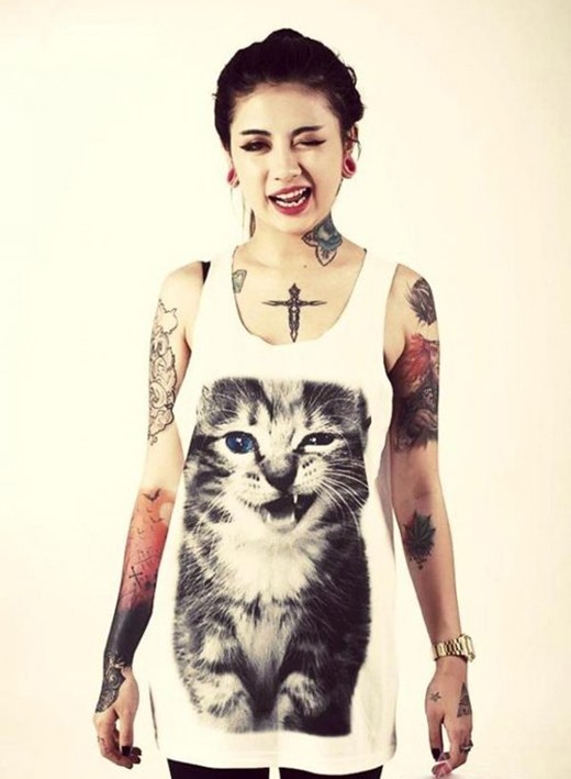 Trầm trồ với sự can đảm của các cô gái xăm 'kín' người ảnh 1