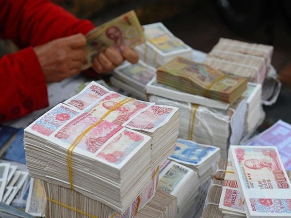 Loạn phí đổi tiền lẻ dịp Tết Nguyên đán 2016 ảnh 2