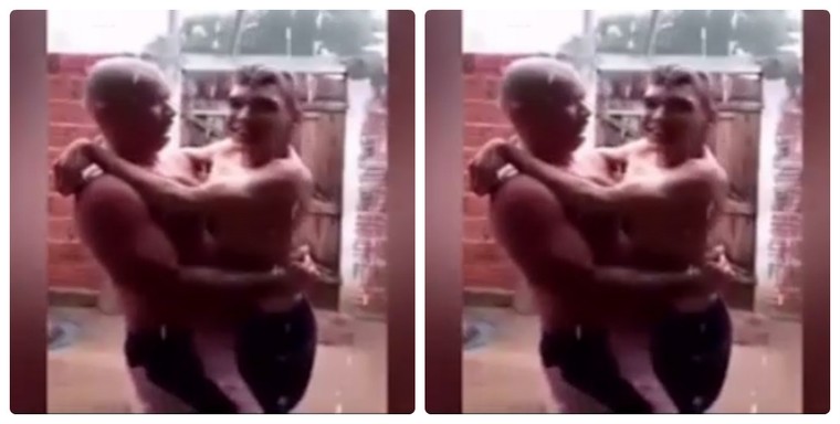 Xúc động video bố bế con tật nguyền tắm mưa ảnh 1