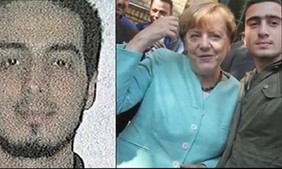 Báo Đức bác tin bà Merkel chụp ảnh 'selfie' với khủng bố ảnh 1