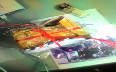 Bắt “nữ quái” vận chuyển 15 bánh heroin tại cây xăng ở Hà Nội ảnh 1