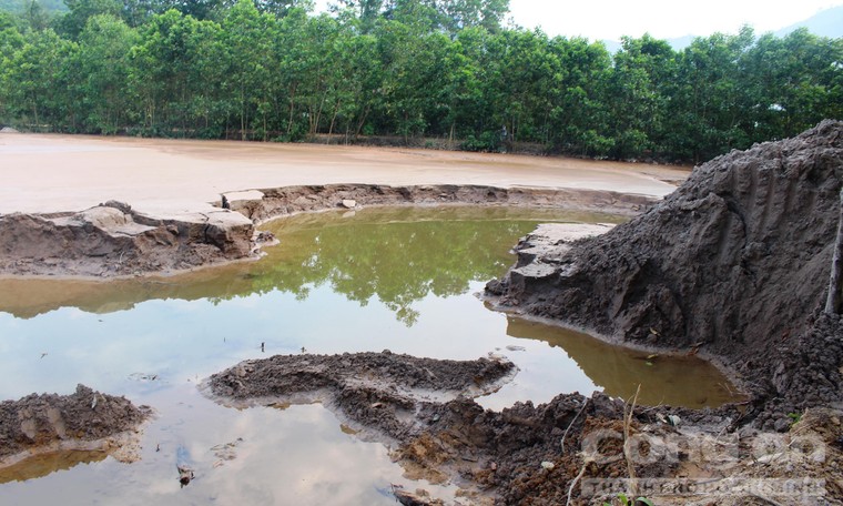 Vụ vỡ đập chứa nước thải khai thác vàng: Công ty phá đập ảnh 1