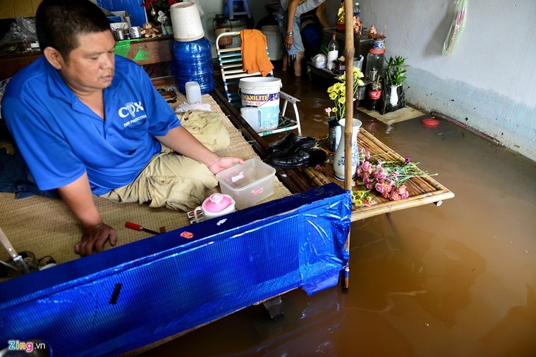 Sống chung với nước ngập cả ngày ở Sài Gòn ảnh 15