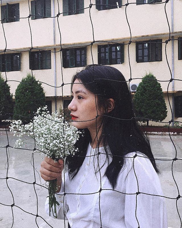 Nhan sắc xinh đẹp của nữ sinh tặng hoa ông Kim Jong Un ảnh 5