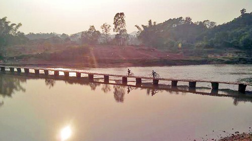 Sông Kỳ Cùng đoạn chảy trên đất Việt Nam dài khoảng bao nhiêu km?