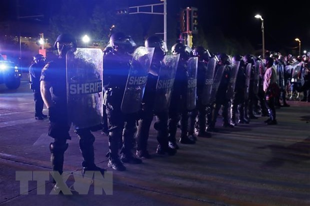 Các ứng cử viên Tổng thống Mỹ lên tiếng về bạo loạn đường phố ảnh 1