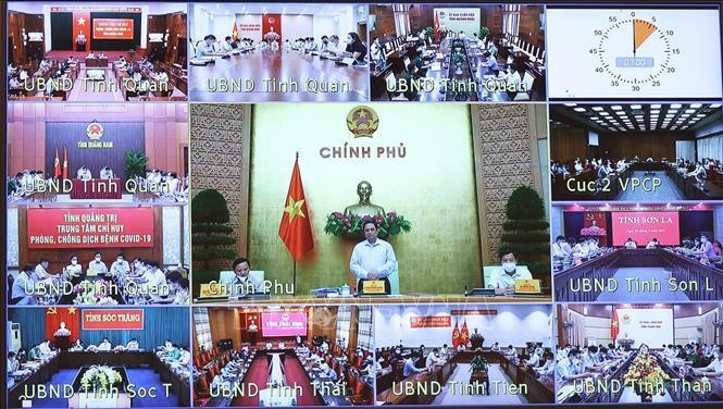 Thủ tướng chủ trì làm việc giữa Ban Chỉ đạo Quốc gia phòng, chống dịch COVID-19 với các địa phương ảnh 3