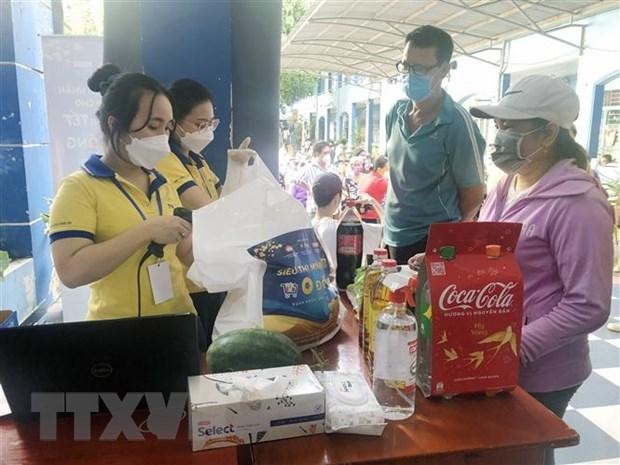 Khởi động chuỗi siêu thị Tết 0 đồng hỗ trợ người dân khó khăn ảnh 1