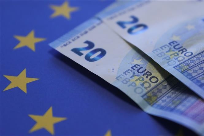 Đồng euro "nổi sóng" giữa lúc USD mất đà ảnh 1