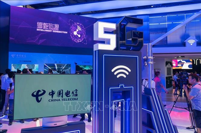 Công nghệ 5G của China Telecom được giới thiệu tại triển lãm thế giới di động ở Thượng Hải, Trung Quốc ngày 27/5/2018. Ảnh: AFP/TTXVN