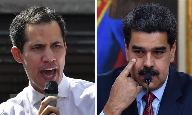 Tổng thống Venezuela Nicolas Maduro (phải) và lãnh đạo đối lập Juan Guaido. (Ảnh: AFP/TTXVN)