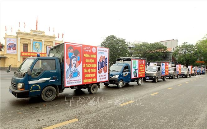 Tuyên truyền về cách phòng, chống dịch COVID-19. Ảnh minh họa: An Đăng/TTXVN