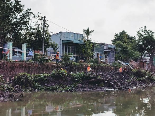 Công nhân thi công tại Dự án cải tạo rạch Cái Sơn - Mương Khai. (Ảnh: Báo Giao thông)