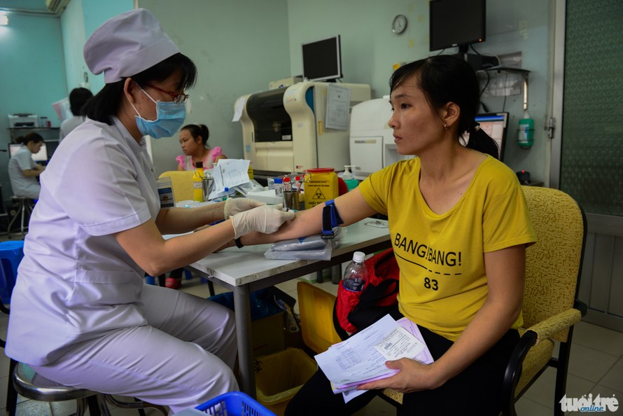 Từ ngày xuất hiện dịch Zika, nhiều bà bầu đã chủ động đi kiểm tra, xét nghiệm để phòng trường hợp xấu nhất xảy ra - Ảnh: Tuổi trẻ